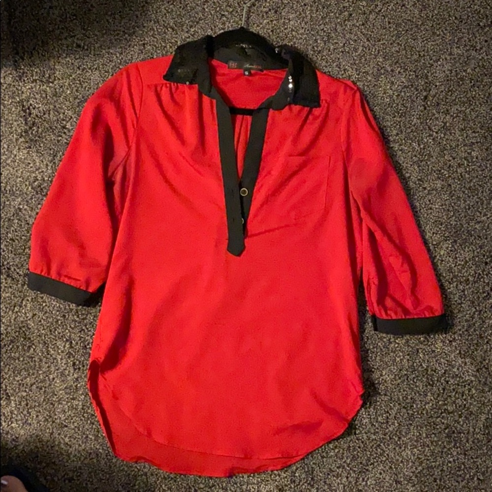 Red tunic with black collar